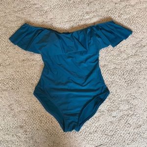 Off the shoulder one piece swimsuit.